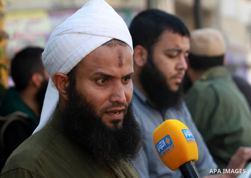 A Palestinian salafist speaks during his funeral procession at Al-Bureij refugee camp in the central Gaza Strip, on October 14, 2012. Saedini, a top Salafist leader whose Islamist faction has recently fired rockets at Is...