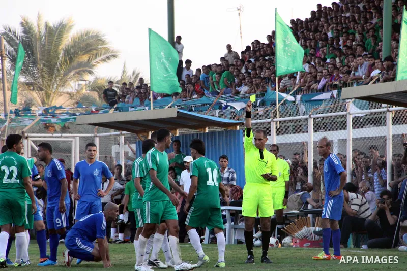 Palestinian soccer team of Rafah Youth and the team of Rafah Services, play during match in Gaza city on Oct. 14, 2012. Photo by Alaa Shamaly