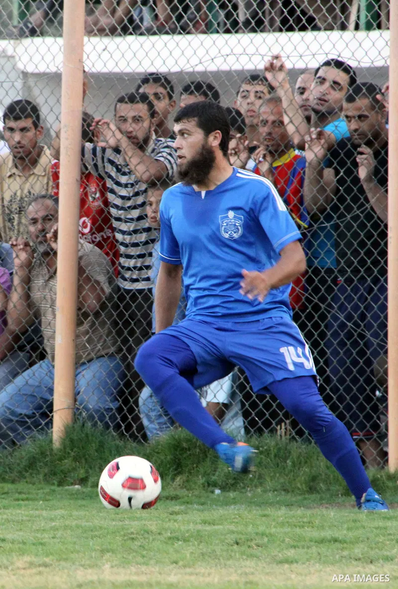 Palestinian soccer team of Rafah Youth and the team of Rafah Services, play during match in Gaza city on Oct. 14, 2012. Photo by Alaa Shamaly
