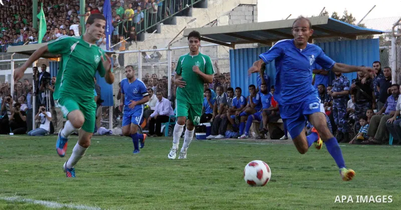 Palestinian soccer team of Rafah Youth and the team of Rafah Services, play during match in Gaza city on Oct. 14, 2012. Photo by Alaa Shamaly