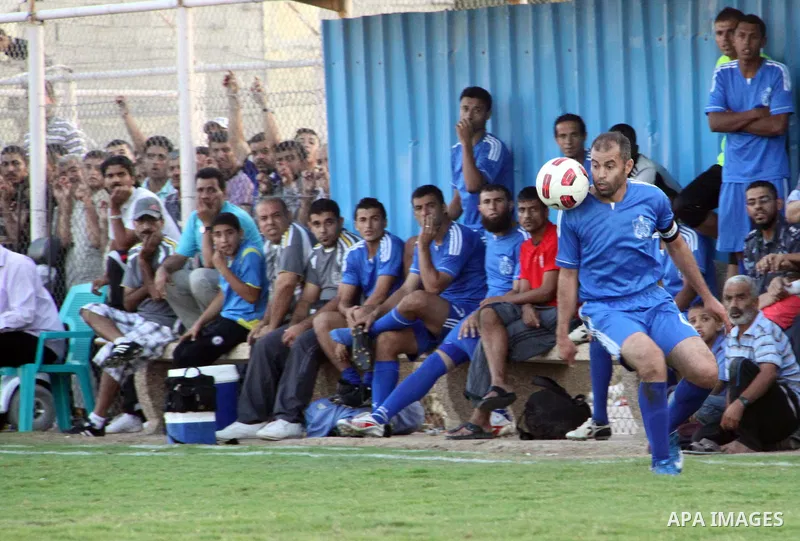 Palestinian soccer team of Rafah Youth and the team of Rafah Services, play during match in Gaza city on Oct. 14, 2012. Photo by Alaa Shamaly