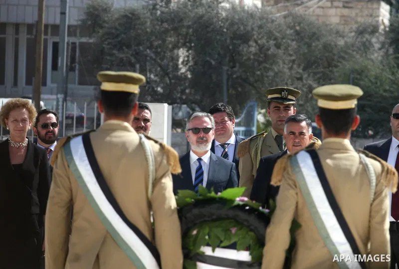 Brazilian foreign Minister Antonio Patriota lays a wreath to the tomb of former Palestinian President and PLO-leader Yassir Arafat during a visit to the West Bank city of Ramallah, October 15, 2012. Photo by Issam Rimawi