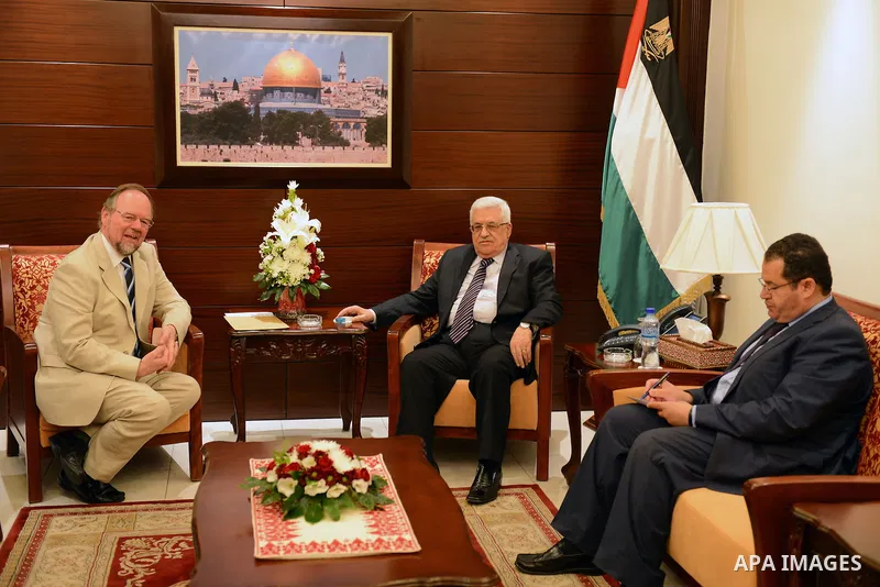 Palestinian President Mahmoud Abbas meets with the British consul, in the West Bank city of Ramallah on October 15, 2012. Photo by Thaer Ganaim