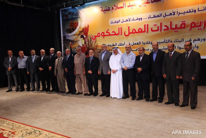 Palestinian Prime Minister in Gaza strip Ismail Haniyeh attends a ceremony to honor members of Gaza Government, in Gaza City on oct. 16, 2012 . Photo by Office of the Prime Minister's Media