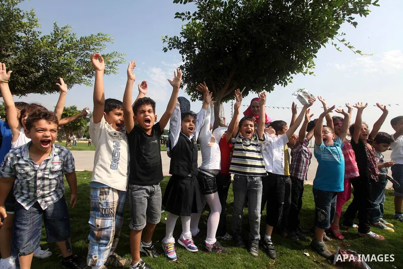 Palestinian children enjoy playing at the Al-Bashir amusement park on the outskirts of Gaza City on Oct. 18, 2012. Photo by Majdi Fathi