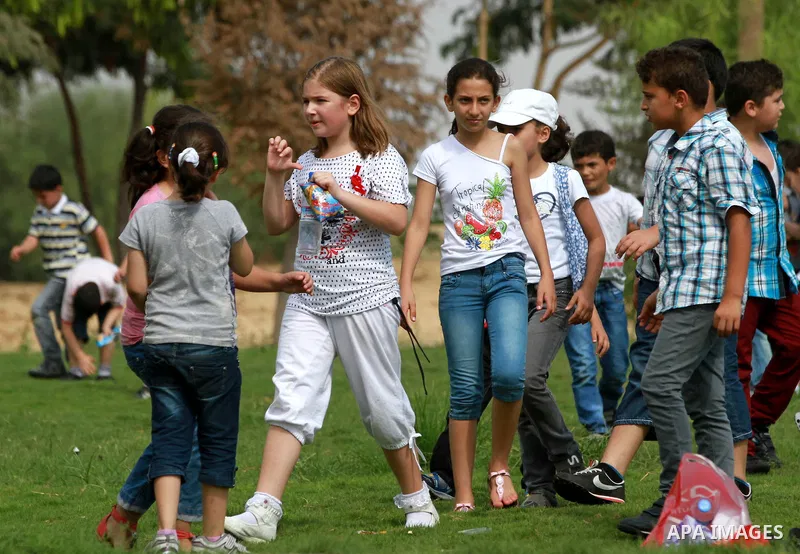 Palestinian children enjoy playing at the Al-Bashir amusement park on the outskirts of Gaza City on Oct. 18, 2012. Photo by Majdi Fathi