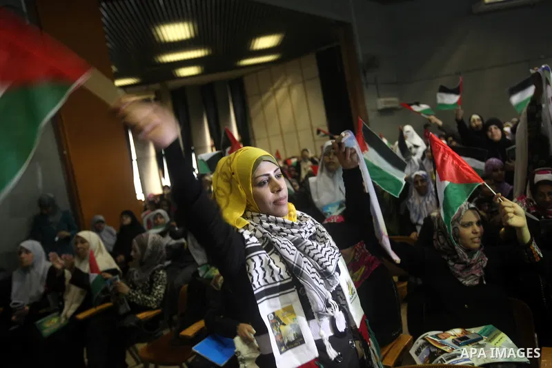 Palestinians attend a ceremony to mark the first anniversary of a deal which saw the exchange of 1,027 Palestinian prisoners for captured Israeli soldier Gilad Shalit, in Gaza city on 18 October 2012. The snatching of Is...