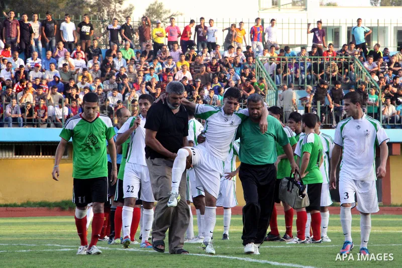 Palestinian soccer team of Shijaia and team of Rafah services, play during Match Clasico in Gaza city on Oct. 19, 2012. Photo by Alaa Shamaly