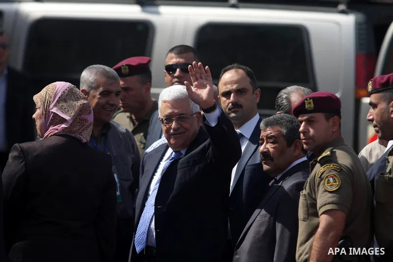 Palestinian president Mahmud Abbas speaks to the press after voting for the municipal elections at a polling station in Al-Bireh, a town adjacent to the West Bank city of Ramallah, on October 20, 2012. Palestinians in th...