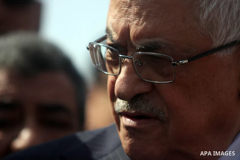 Palestinian president Mahmud Abbas speaks to the press after voting for the municipal elections at a polling station in Al-Bireh, a town adjacent to the West Bank city of Ramallah, on October 20, 2012. Palestinians in th...