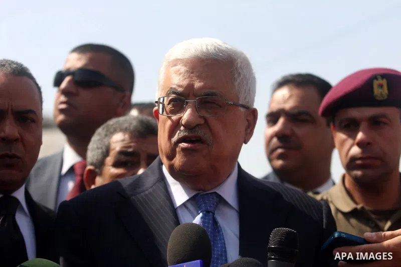 Palestinian president Mahmud Abbas speaks to the press after voting for the municipal elections at a polling station in Al-Bireh, a town adjacent to the West Bank city of Ramallah, on October 20, 2012. Palestinians in th...