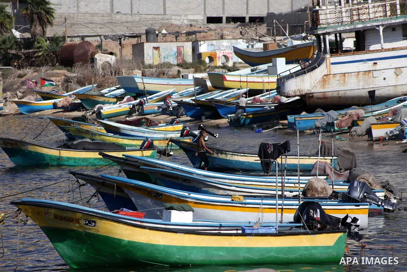 Palestinian fishermen prepare their nets in Gaza City's harbour on October 20, 2012. Israeli soldiers commandeered a vessel carrying pro-Palestinian activists destined for Gaza on Saturday, cutting off communications and...