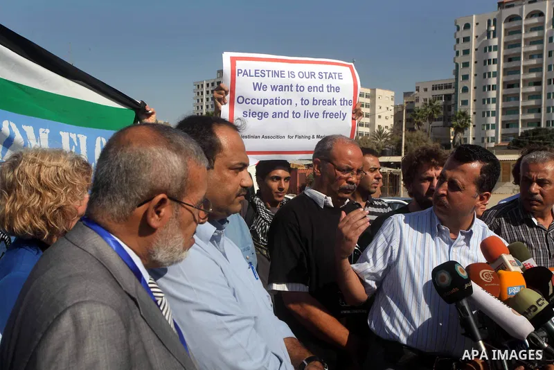 Jewish-American scholar and activist Noam Chomsky stands during a press conference to support the Gaza-bound flotilla in the port of Gaza City, Saturday, Oct. 20 , 2012. Israeli soldiers commandeered a vessel carrying pr...