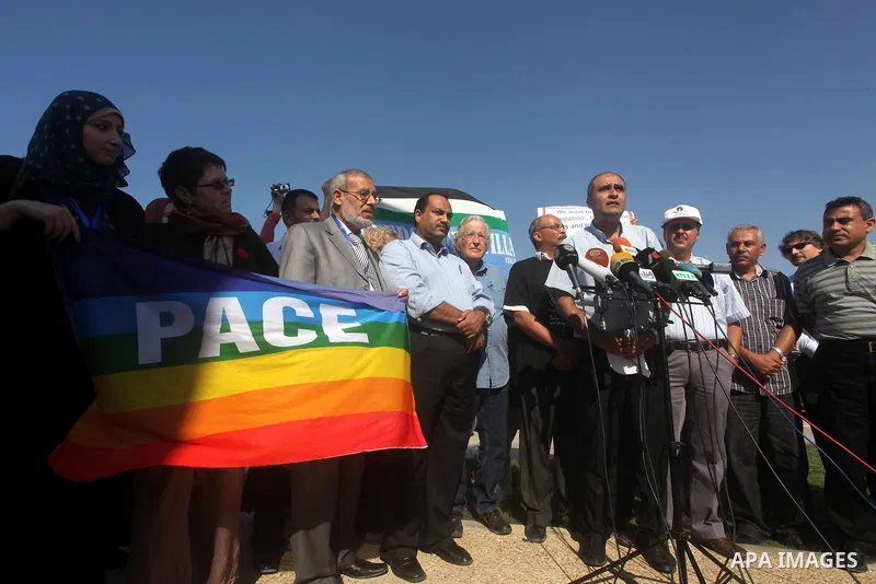 Jewish-American scholar and activist Noam Chomsky stands during a press conference to support the Gaza-bound flotilla in the port of Gaza City, Saturday, Oct. 20 , 2012. Israeli soldiers commandeered a vessel carrying pr...