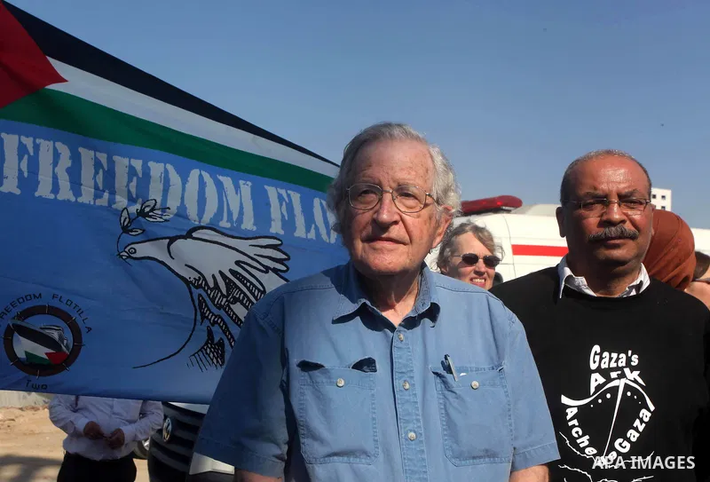 Jewish-American scholar and activist Noam Chomsky stands during a press conference to support the Gaza-bound flotilla in the port of Gaza City, Saturday, Oct. 20 , 2012. Israeli soldiers commandeered a vessel carrying pr...
