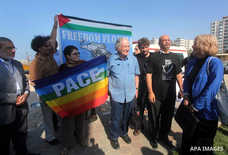 Jewish-American scholar and activist Noam Chomsky stands during a press conference to support the Gaza-bound flotilla in the port of Gaza City, Saturday, Oct. 20 , 2012. Israeli soldiers commandeered a vessel carrying pr...