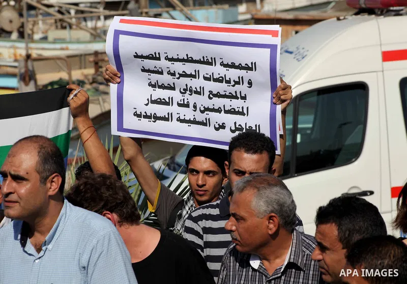 Jewish-American scholar and activist Noam Chomsky stands during a press conference to support the Gaza-bound flotilla in the port of Gaza City, Saturday, Oct. 20 , 2012. Israeli soldiers commandeered a vessel carrying pr...