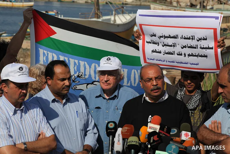 Jewish-American scholar and activist Noam Chomsky stands during a press conference to support the Gaza-bound flotilla in the port of Gaza City, Saturday, Oct. 20 , 2012. Israeli soldiers commandeered a vessel carrying pr...