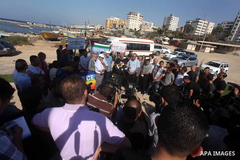 Jewish-American scholar and activist Noam Chomsky stands during a press conference to support the Gaza-bound flotilla in the port of Gaza City, Saturday, Oct. 20 , 2012. Israeli soldiers commandeered a vessel carrying pr...