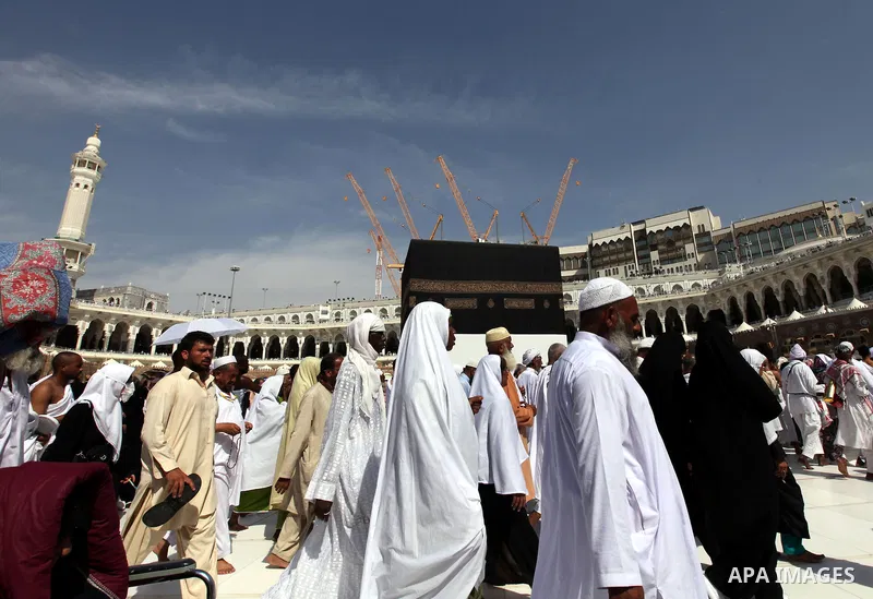 Muslim pilgrims walk around the Kaaba in the Grand Mosque of the holy city of Mecca on October 21, 2012. Over two million Muslims from around the world are expected to perform the upcoming Hajj or pilgrimage. Photo by Mo...