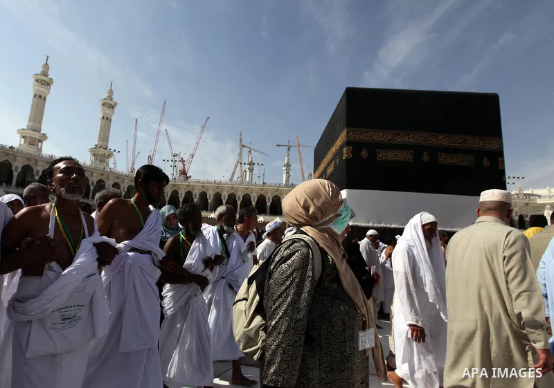 Muslim pilgrims walk around the Kaaba in the Grand Mosque of the holy city of Mecca on October 21, 2012. Over two million Muslims from around the world are expected to perform the upcoming Hajj or pilgrimage. Photo by Mo...