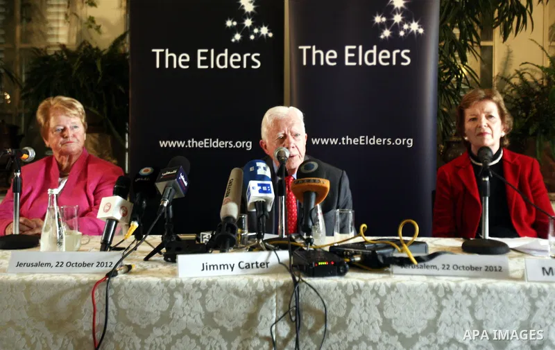 Former US president Jimmy Carter speaks during a press conference after the results of Palestinian local government elections, in Jerusalem on Oct. 22, 2012. Photo by Mahfouz Abu Turk