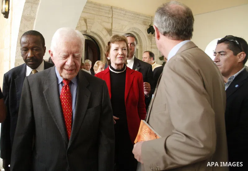 Former US president Jimmy Carter attends a press conference after the results of Palestinian local government elections, in Jerusalem on Oct. 22, 2012. Photo by Mahfouz Abu Turk