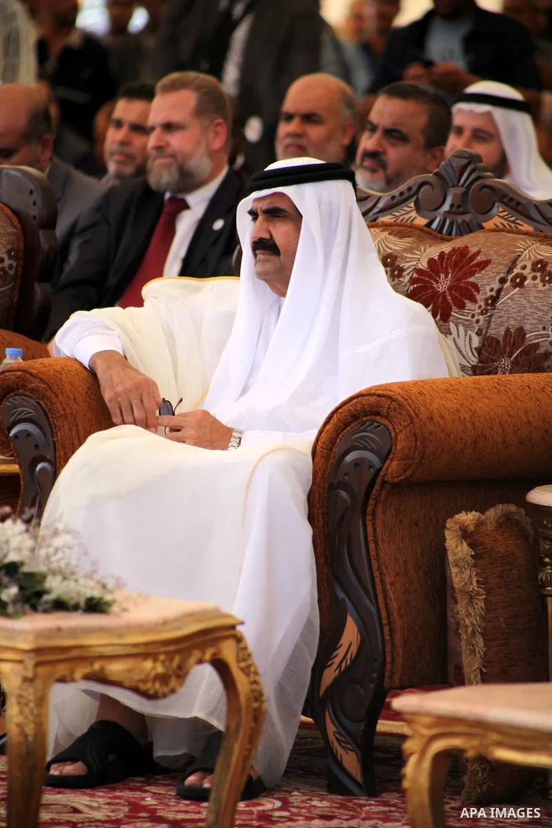 Emir of Qatar Sheik Hamad bin Khalifa al-Thani attends a cornerstone laying ceremony for Hamad, a new residential neighbourhood in Khan Younis in the southern Gaza Strip, 23 October 2012. The Emir of Qatar entered the Ga...