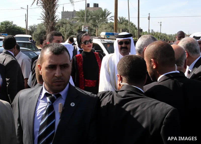 Palestinian Prime Minister in Gaza strip, Ismail Haniyeh and the Emir of Qatar Sheikh Hamad bin Khalifa al-Thani attend a cornerstone laying ceremony for rehabilitation Salah al-Din street in the central Gaza Strip Octob...