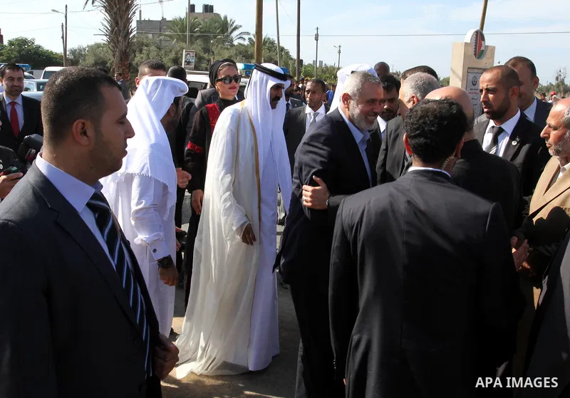 Palestinian Prime Minister in Gaza strip, Ismail Haniyeh and the Emir of Qatar Sheikh Hamad bin Khalifa al-Thani attend a cornerstone laying ceremony for rehabilitation Salah al-Din street in the central Gaza Strip Octob...