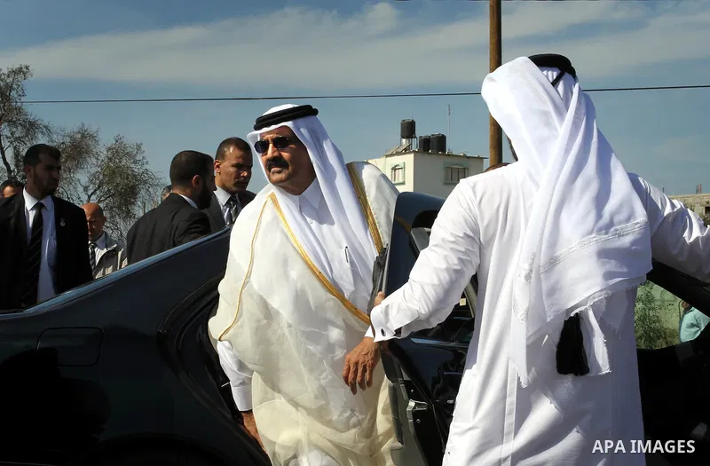 Palestinian Prime Minister in Gaza strip, Ismail Haniyeh and the Emir of Qatar Sheikh Hamad bin Khalifa al-Thani attend a cornerstone laying ceremony for rehabilitation Salah al-Din street in the central Gaza Strip Octob...