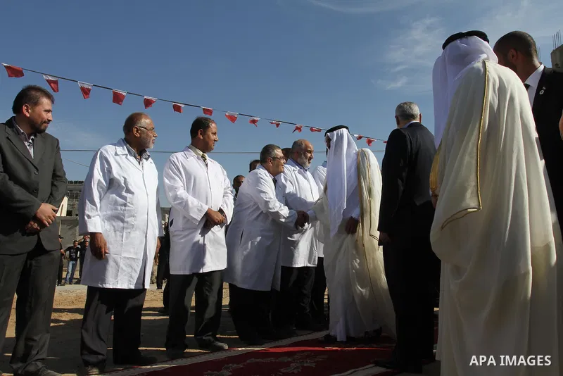 Palestinian Prime Minister in Gaza strip, Ismail Haniyeh and the Emir of Qatar Sheikh Hamad bin Khalifa al-Thani attend a cornerstone laying ceremony for a hospital in Gaza city October 23, 2012. The Emir of Qatar entere...