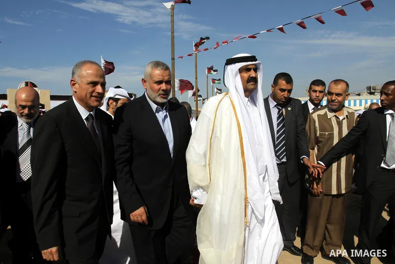 Palestinian Prime Minister in Gaza strip, Ismail Haniyeh and the Emir of Qatar Sheikh Hamad bin Khalifa al-Thani attend a cornerstone laying ceremony for a hospital in Gaza city October 23, 2012. The Emir of Qatar entere...