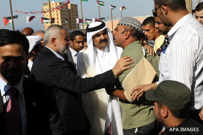 Palestinian Prime Minister in Gaza strip, Ismail Haniyeh and the Emir of Qatar Sheikh Hamad bin Khalifa al-Thani attend a cornerstone laying ceremony for a hospital in Gaza city October 23, 2012. The Emir of Qatar entere...