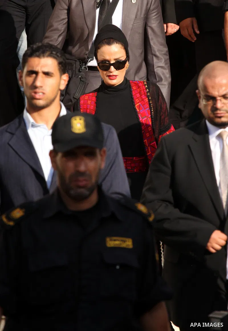 Qatar's First Lady Sheikha Mozah bint Nasser al-Missned leaves the Atfaluna Society for Deaf Children in the Gaza Strip on October 23, 2012. The Emir of Qatar entered the Gaza Strip on Tuesday for a visit that broke the...