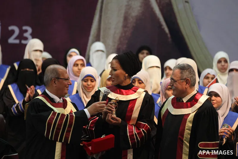 Qatar's First Lady Sheikha Mozah bint Nasser al-Missned attends a celebration at the Islamic University in Gaza city on October 23, 2012. The Emir of Qatar entered the Gaza Strip on Tuesday for a visit that broke the iso...