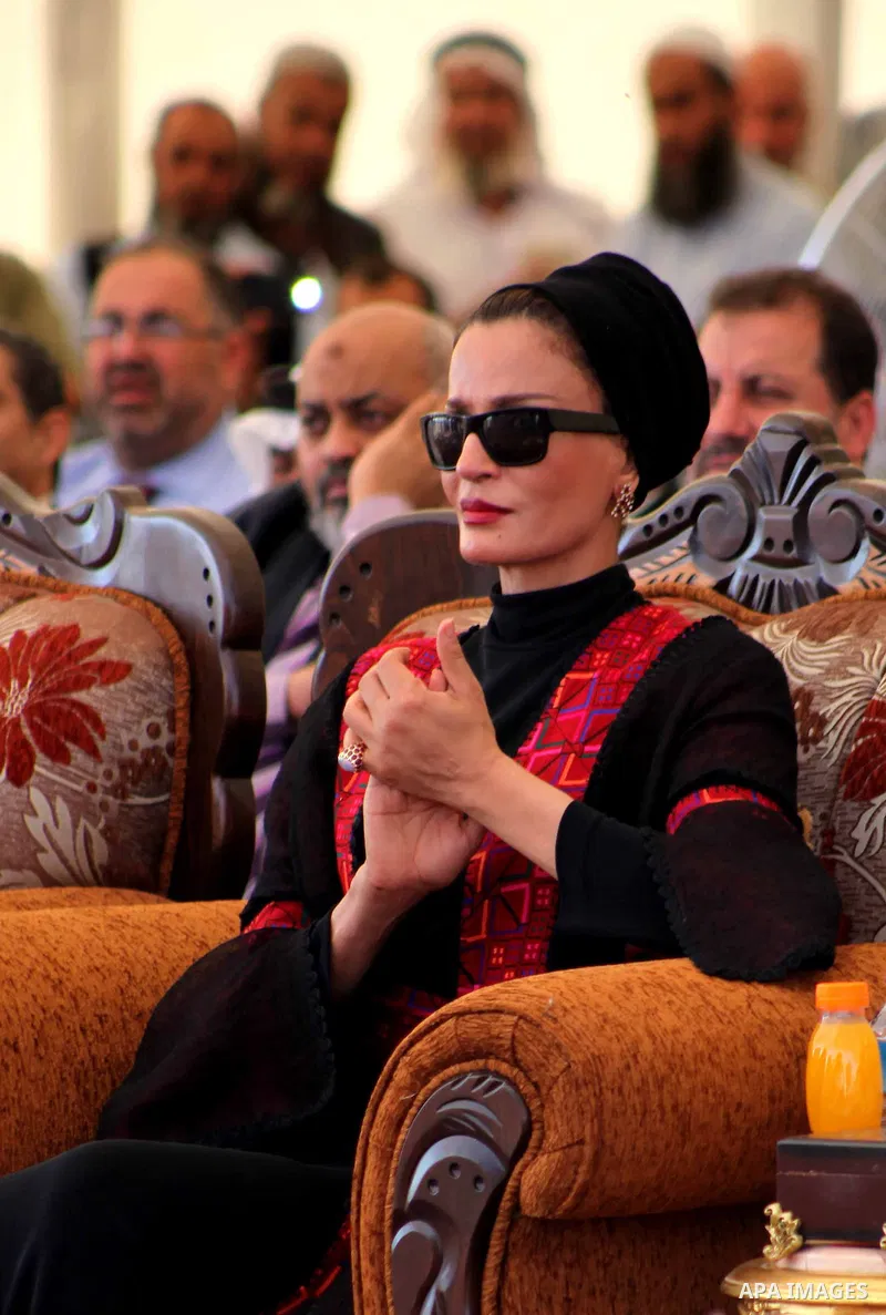 Qatar's First Lady Sheikha Mozah bint Nasser al-Missned attends a cornerstone laying ceremony for Hamad, a new residential neighbourhood in Khan Younis in the southern Gaza Strip, 23 October 2012. The Emir of Qatar enter...