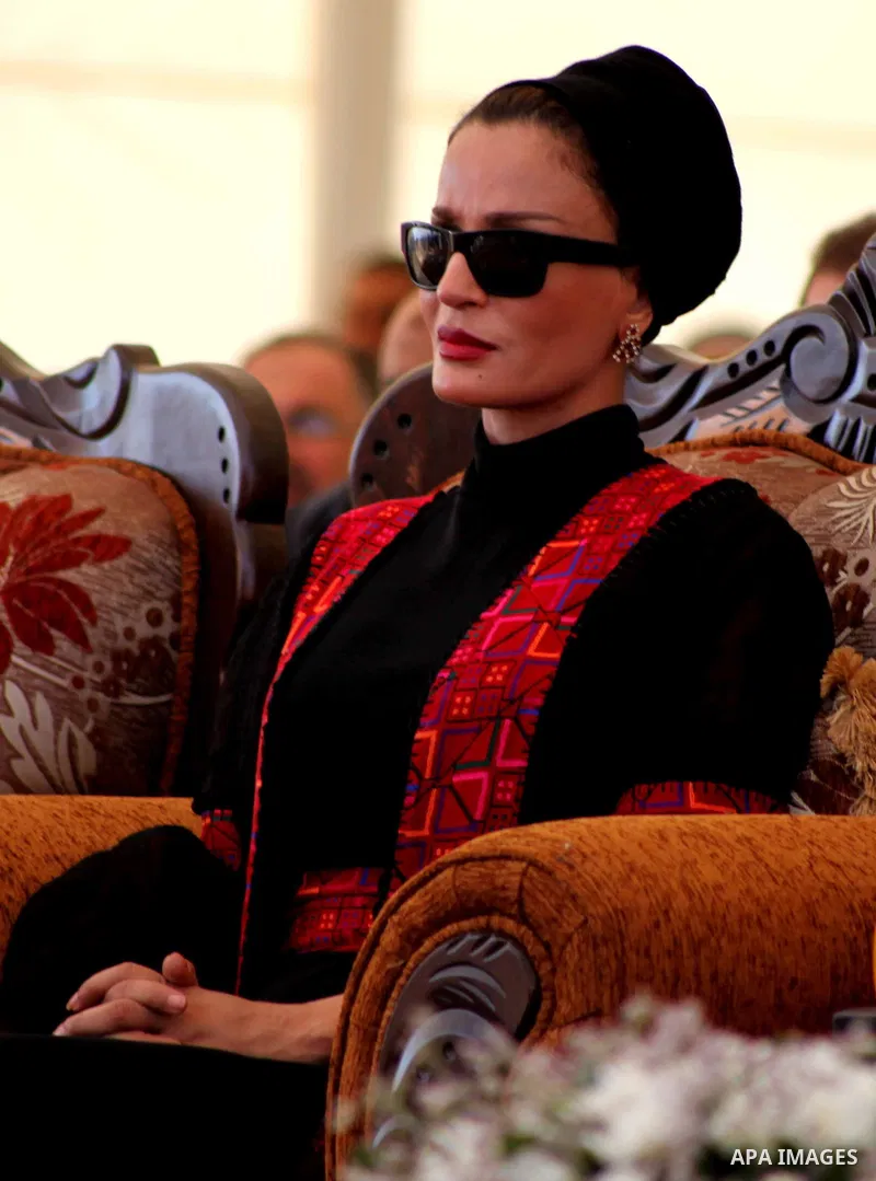 Qatar's First Lady Sheikha Mozah bint Nasser al-Missned attends a cornerstone laying ceremony for Hamad, a new residential neighbourhood in Khan Younis in the southern Gaza Strip, 23 October 2012. The Emir of Qatar enter...