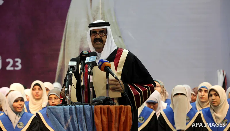 Qatari Emir Sheikh Hamad bin Khalifa al-Thani speaks during a celebration at the Islamic University in Gaza city on October 23, 2012. The Emir of Qatar entered the Gaza Strip on Tuesday for a visit that broke the isolati...