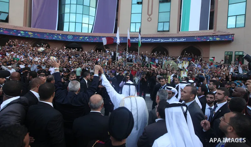 Qatari Emir Sheikh Hamad bin Khalifa al-Thani attends a celebration at the Islamic University in Gaza city on October 23, 2012. The Emir of Qatar entered the Gaza Strip on Tuesday for a visit that broke the isolation of...