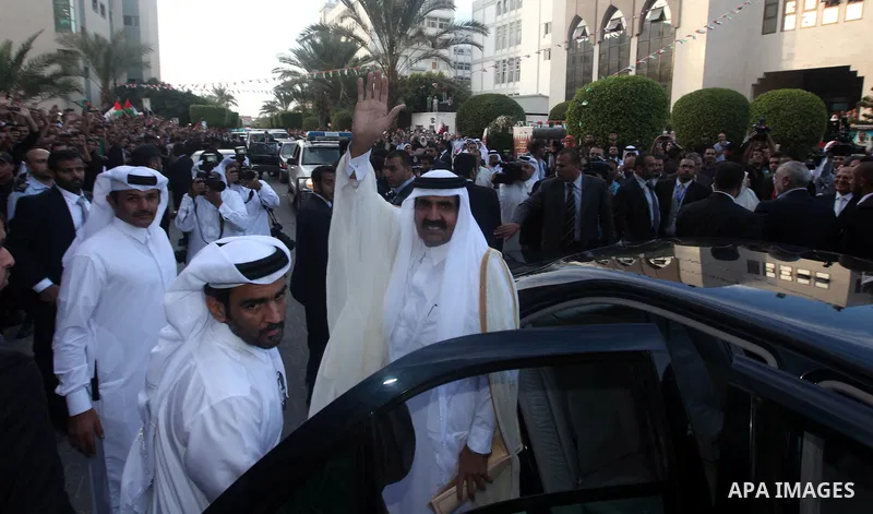 Qatari Emir Sheikh Hamad bin Khalifa al-Thani attends a celebration at the Islamic University in Gaza city on October 23, 2012. The Emir of Qatar entered the Gaza Strip on Tuesday for a visit that broke the isolation of...