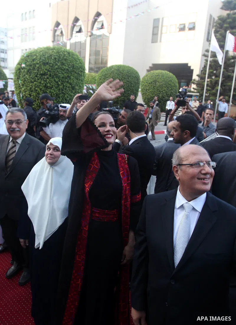 Qatar's First Lady Sheikha Mozah bint Nasser al-Missned attends a celebration at the Islamic University in Gaza city on October 23, 2012. The Emir of Qatar entered the Gaza Strip on Tuesday for a visit that broke the iso...