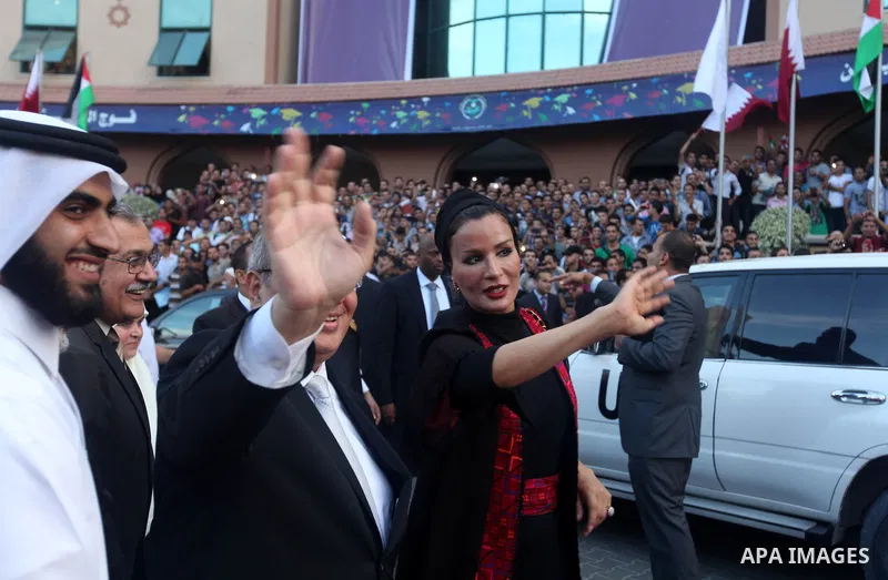 Qatar's First Lady Sheikha Mozah bint Nasser al-Missned attends a celebration at the Islamic University in Gaza city on October 23, 2012. The Emir of Qatar entered the Gaza Strip on Tuesday for a visit that broke the iso...