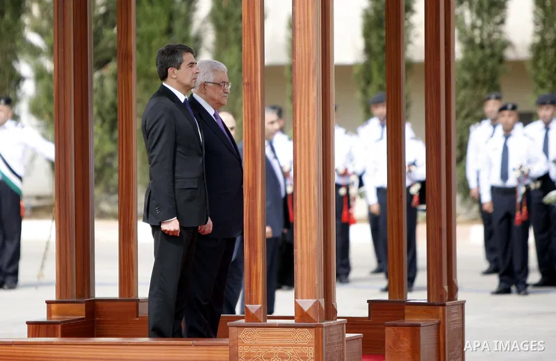 Palestinian President Mahmoud Abbas, Right, and Bulgarian President Rosen Plevneliev review an honor guard prior to their meeting in the West Bank city of Ramallah, Oct. 24, 2012. Photo by Issam Rimawi