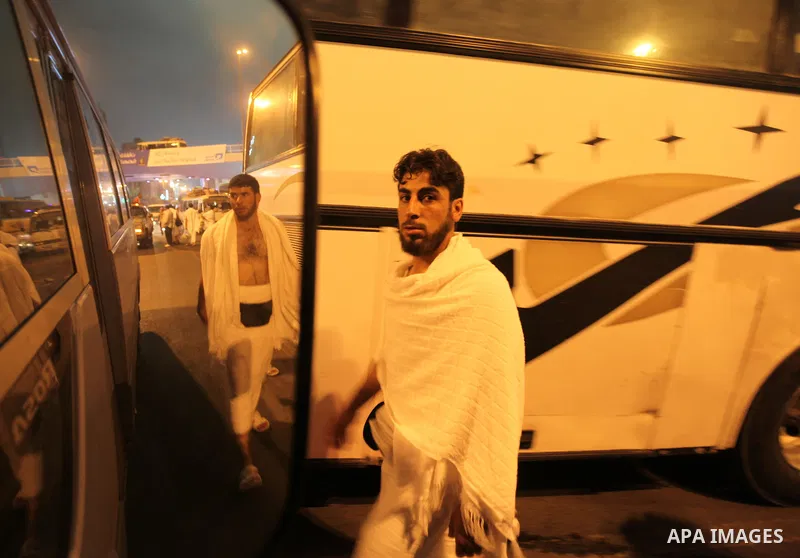 Muslim pilgrims sit on top of a bus on the way to Mount Arafat at the peak of the annual pilgrimage near the holy city of Mecca October 24, 2012. Nearly 3 million Muslim pilgrims started the first phase of the annual haj...