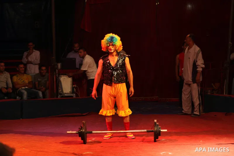 Palestinians watch members of the Egyptian National Circus, perform in Gaza City, Oct. 27, 2012. The Egyptian National Circus put on its first show of a month-long visit to the impoverished coastal territory, a sign of w...