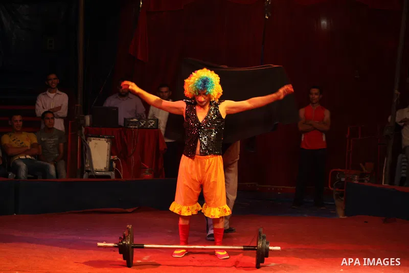 Palestinians watch members of the Egyptian National Circus, perform in Gaza City, Oct. 27, 2012. The Egyptian National Circus put on its first show of a month-long visit to the impoverished coastal territory, a sign of w...