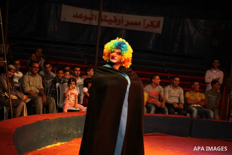 Palestinians watch members of the Egyptian National Circus, perform in Gaza City, Oct. 27, 2012. The Egyptian National Circus put on its first show of a month-long visit to the impoverished coastal territory, a sign of w...