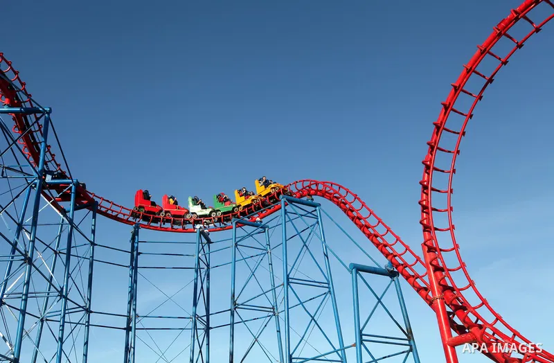 Palestinians enjoy themselves at an amusement park in Gaza City as the Muslim world celebrates the third day of the Eid al-Adha holiday on October 28, 2012. Eid al-Adha or "Feast of the Sacrifice" marks the end of the an...
