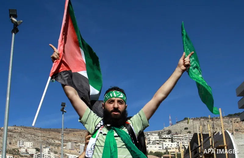 Palestinian Hamas member Hassan Safadi is greeted by his relatives as he arrive in the West Bank city of Nablus after his release from Israeli jail, Monday, Oct. 29, 2012. Hassan reportedly went on an on-and-off hunger s...